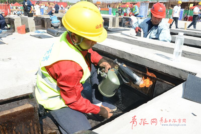 比速度拼質(zhì)量！青島農(nóng)民工建筑技能大比拼(圖2)